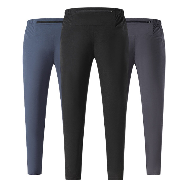 Pantalones deportivos al aire libre Otoño e Invierno hombres corriendo fitness pantalones de secado rápido sueltos transpirables deportes casuales pantalones de entrenamiento de secado rápido