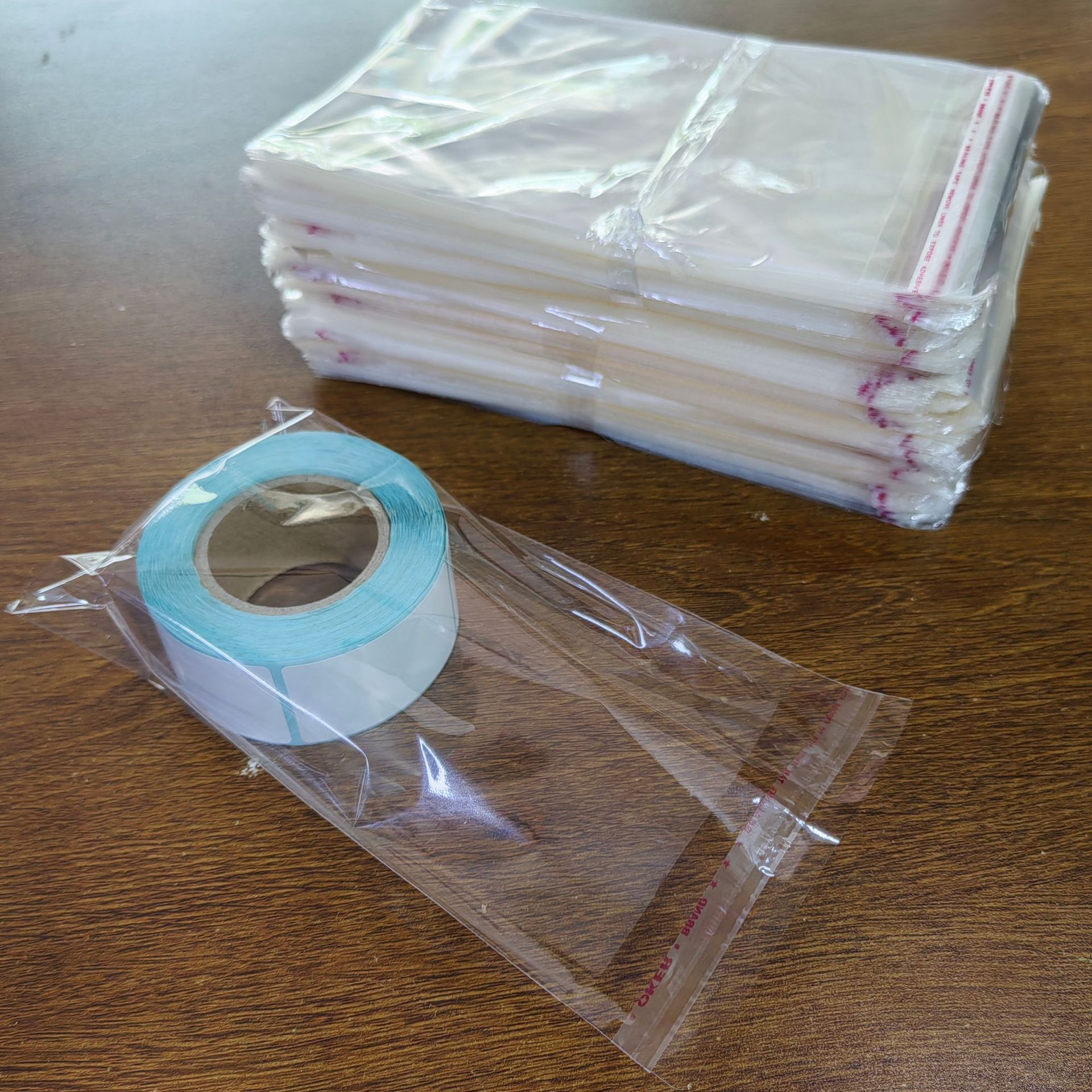 OPP不干胶自粘袋透明袋子衣服包装袋 口罩自封塑料现货批发