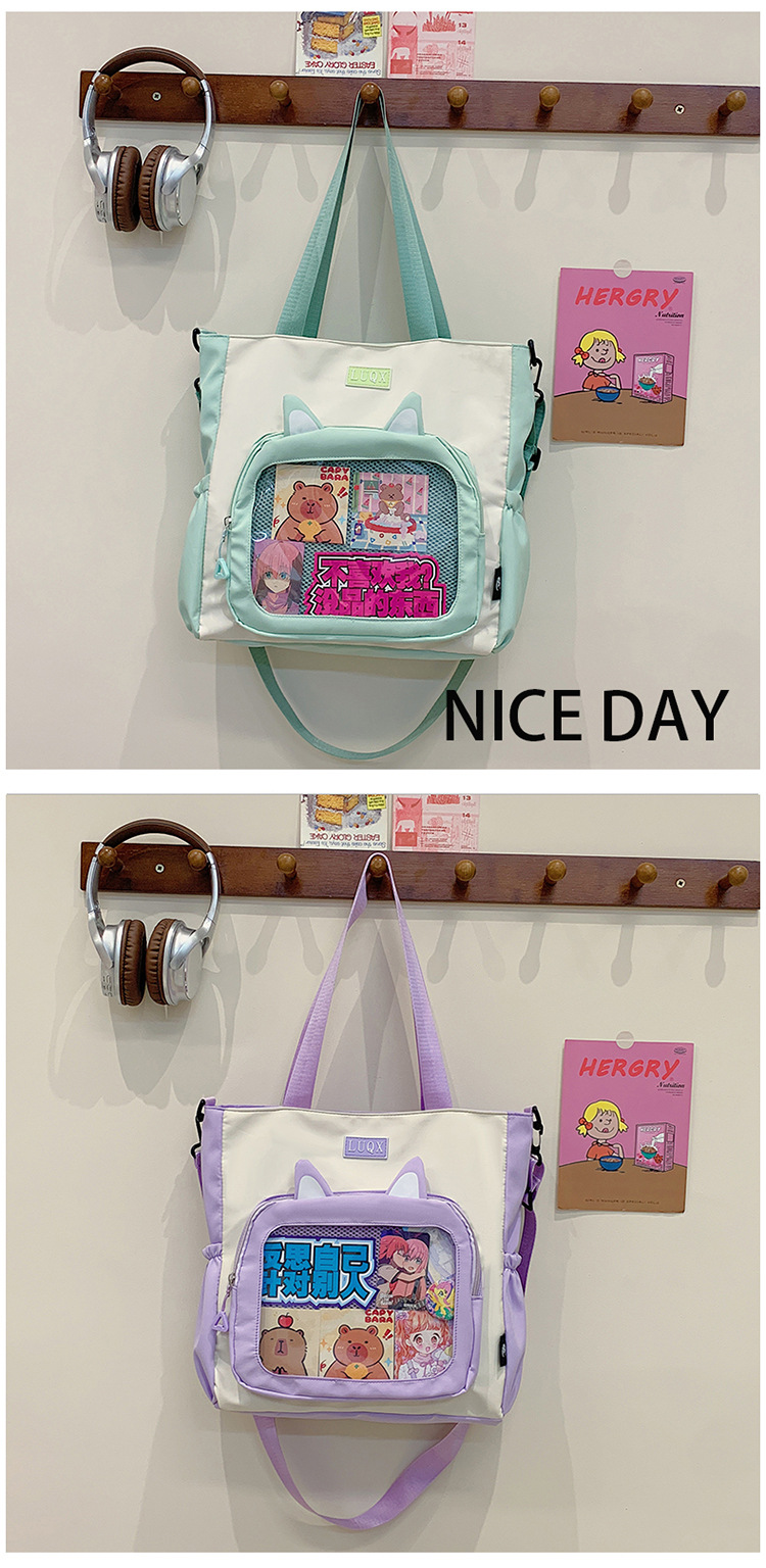 The new cute cartoon printed student bag with a large capacity and transparent student storage single-shoulder bag is selling well for women undefined