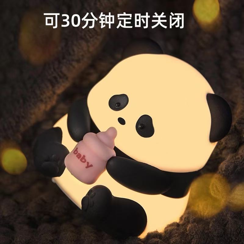 Fuente de fábrica de venta transfronteriza luz nocturna botellas de leche para bebés panda regalos de cumpleaños de luna llena regalos de ojos
