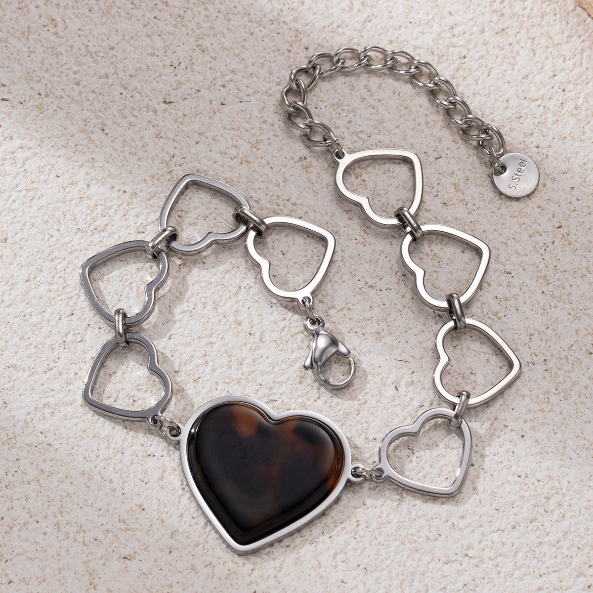 TENA Europa y América de acero inoxidable amor pulsera lujo ligero de alto nivel cadena de amor hueco de acero de titanio bicolor joyería de brazalete