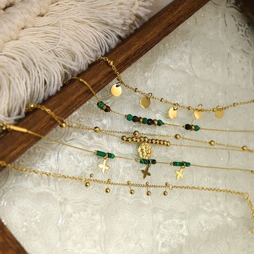 European and American retro natural stone beaded titanium steel bracelet light luxury four-leaf flower disc fashion middle-aged malachite women's hand jewelry