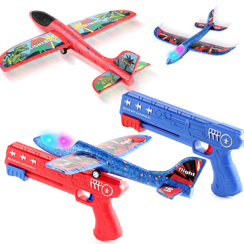 Lanzamiento de un clic espuma emisora de luz Catapulta Aeronave pistola lanzadora de mano planeador juguetes al aire libre para niños puesto de mercado nocturno Juguetes image 4