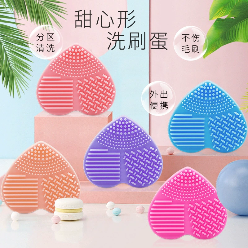 Производители горячие продажи силиконовые чистящие яйца в форме сердца чистящие инструменты артефакт
