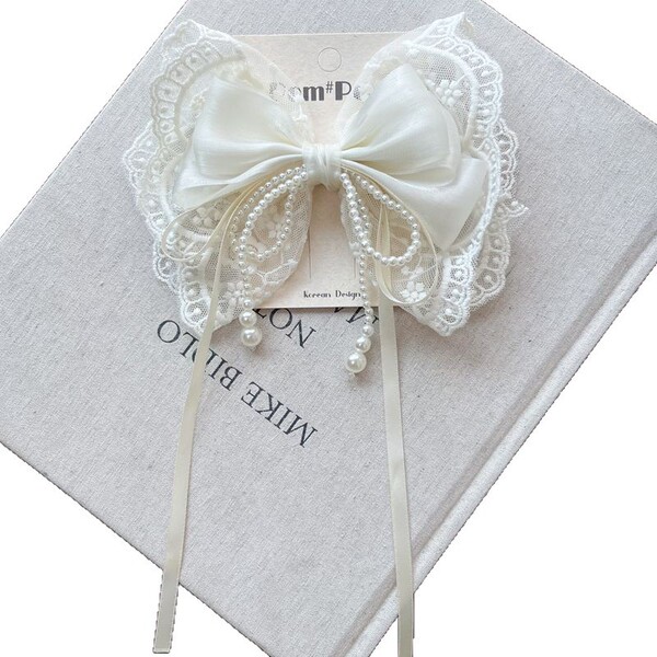 Genuine summer white children's elite hairgrip with bow