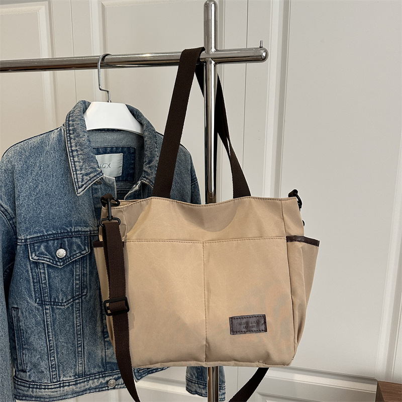 Bolso de lona coreano para mujeres nueva moda ocio de gran capacidad mochila portátil tote simple bolso de hombro para estudiantes