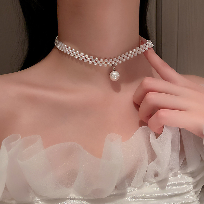 Collar de perlas con lazo de flor con cuentas francesas Elegante cadena de clavícula con sentido de alta gama retro ligero decoración de lujo femenino