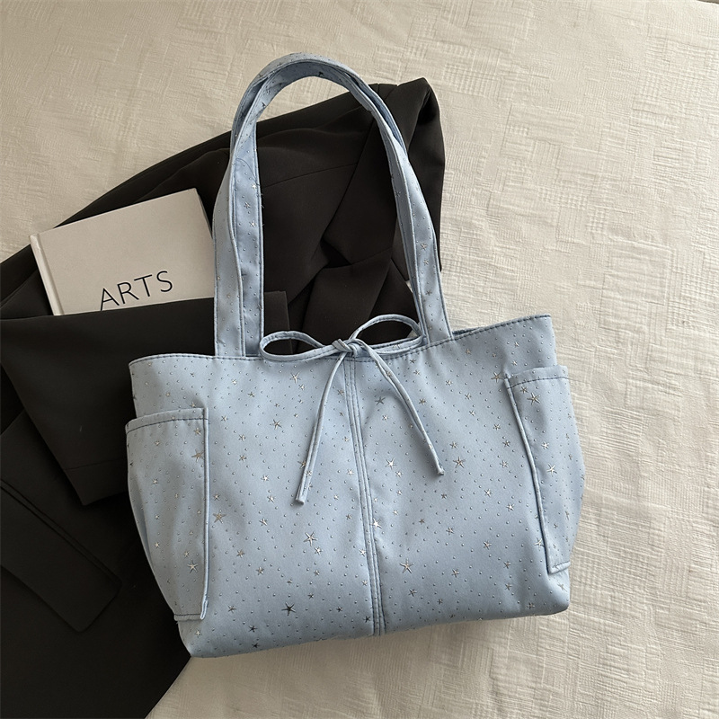 2026 nuevo estilo coreano de impresión de estrellas bolsos de mujer bolsos de gran capacidad de viaje bolsos de hombro de moda bolsos de brazo portátiles