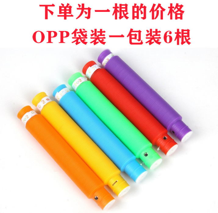 Flash transfronterizo fuelle de ventilación descompresión de luz LED tubo de agua pop tubo de descompresión luminosa tubo telescópico al por mayor