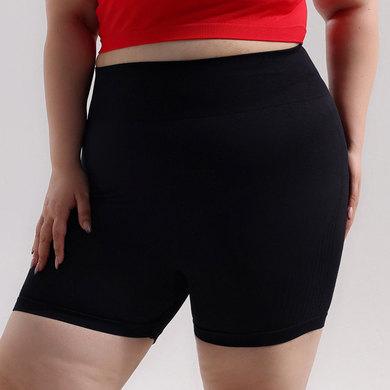 Pantalones cortos de cadera de melocotón deportivos sin costuras de gran tamaño europeos y americanos