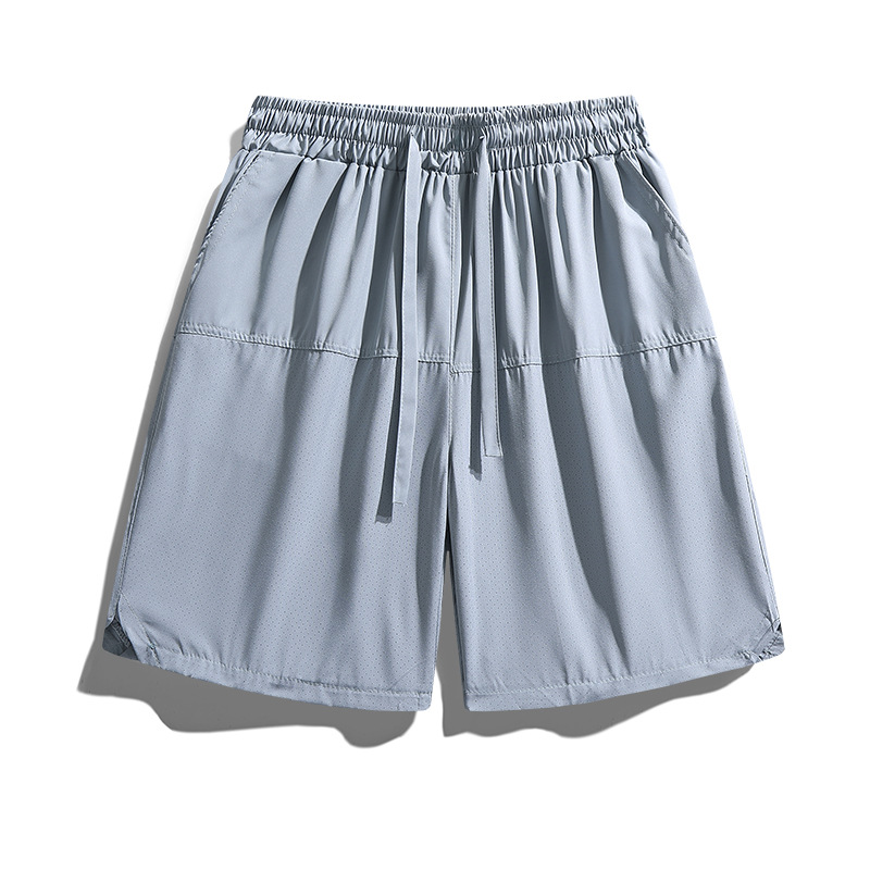 Pantalones cortos casuales de color sólido verano nuevo estilo delgado perforado transpirable pantalones de cinco puntos pantalones sueltos casuales de cinco puntos