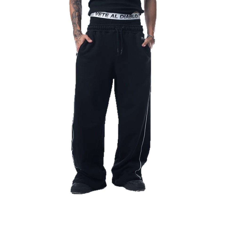 Pantalones deportivos casuales versátiles de pierna recta para otoño e invierno 2025, pantalones holgados retro de moda con costuras laterales de patchwork para hombre.