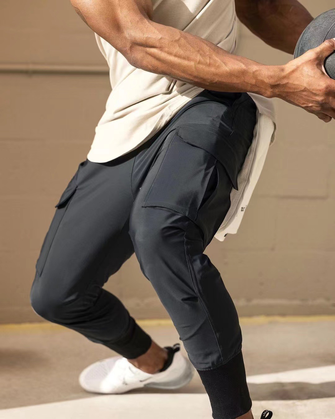 Transfronterizos europeos y americanos multi-bolsa pantalones cremallera pantalones de pierna cerrada moda casual de secado rápido transpirable correr Pantalones deportivos para hombres