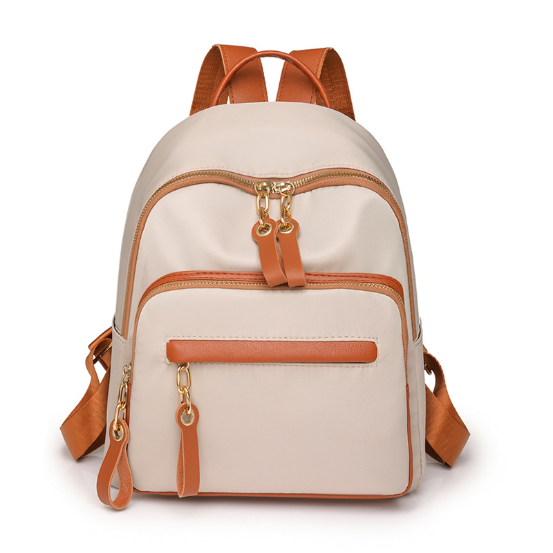 Bolsos para mujer 2023 nueva mochila de nylon para mujer coreana moda contraste color al aire libre mochila de viaje ligera al por mayor