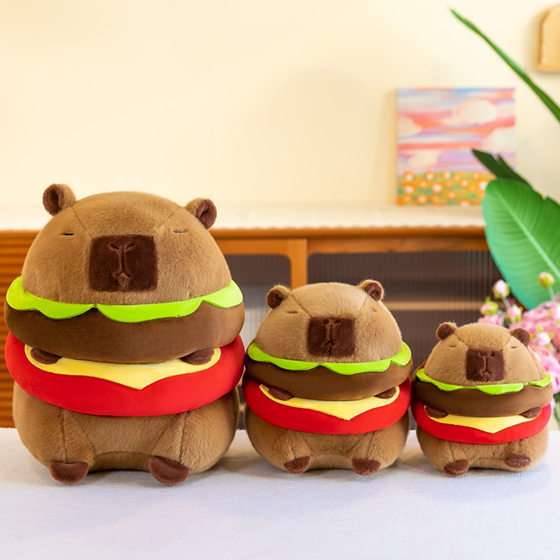 カピバラ人形ハンバーグカピバラぬいぐるみピンクのリュックサックのぬいぐるみが寝ているぬいぐるみがプレゼントされます。|undefined