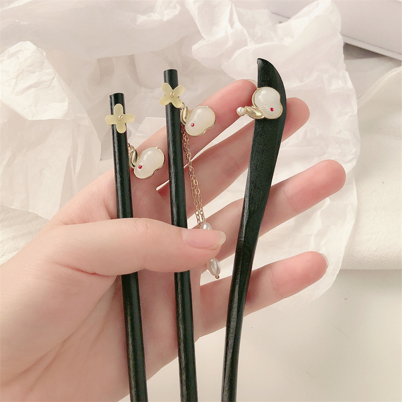 Clipper de cabello de conejo antiguo estilo femenino de alta calidad paso diario mecedor nuevo estilo chino clipper de madera clipper chino chino clipper