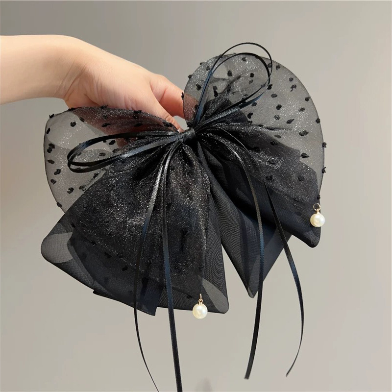 Черный хвостик с бантиком