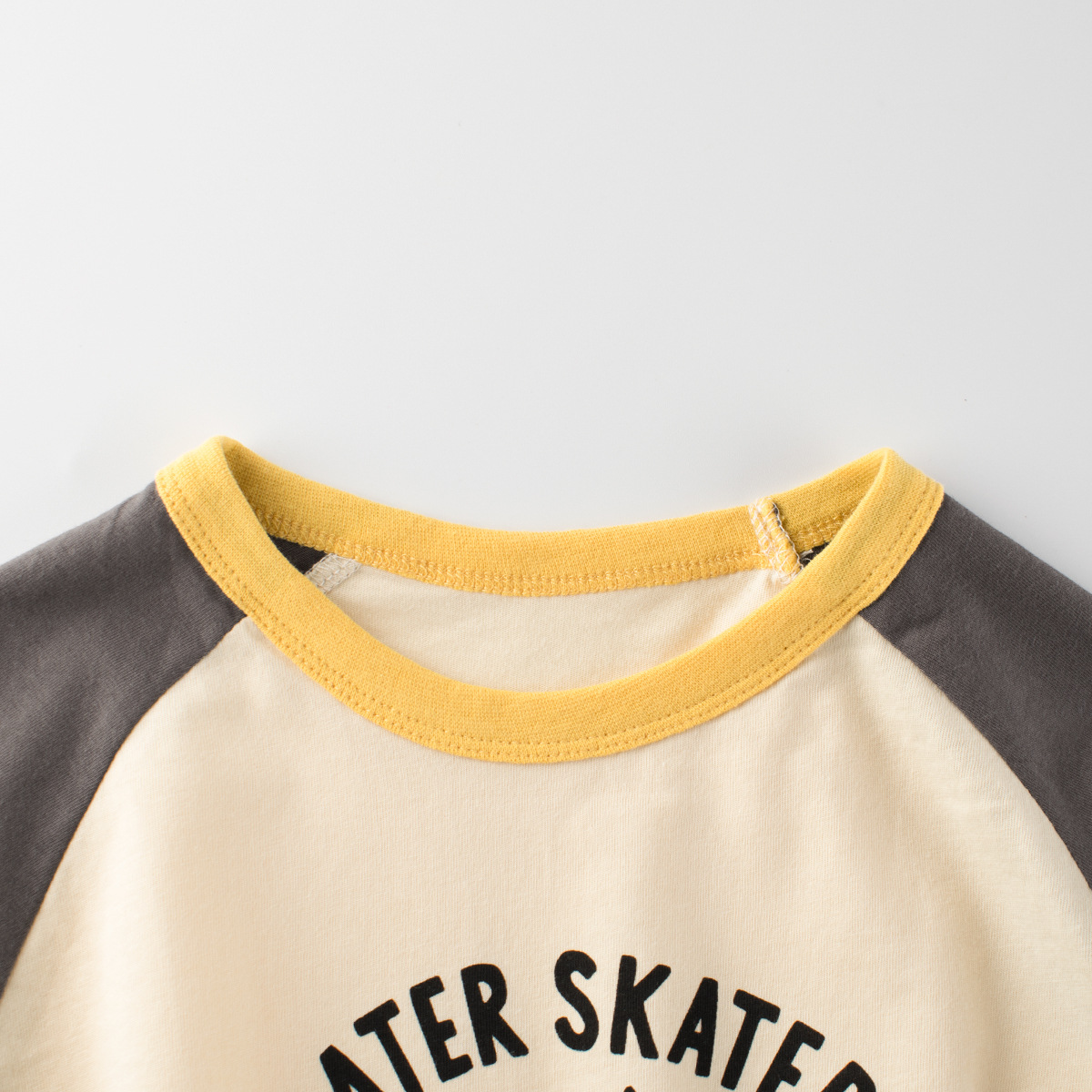 27kids verano nueva ropa para niños dibujos animados coreanos para niños camiseta impresa de manga corta para niños top raglán para bebés al por mayor