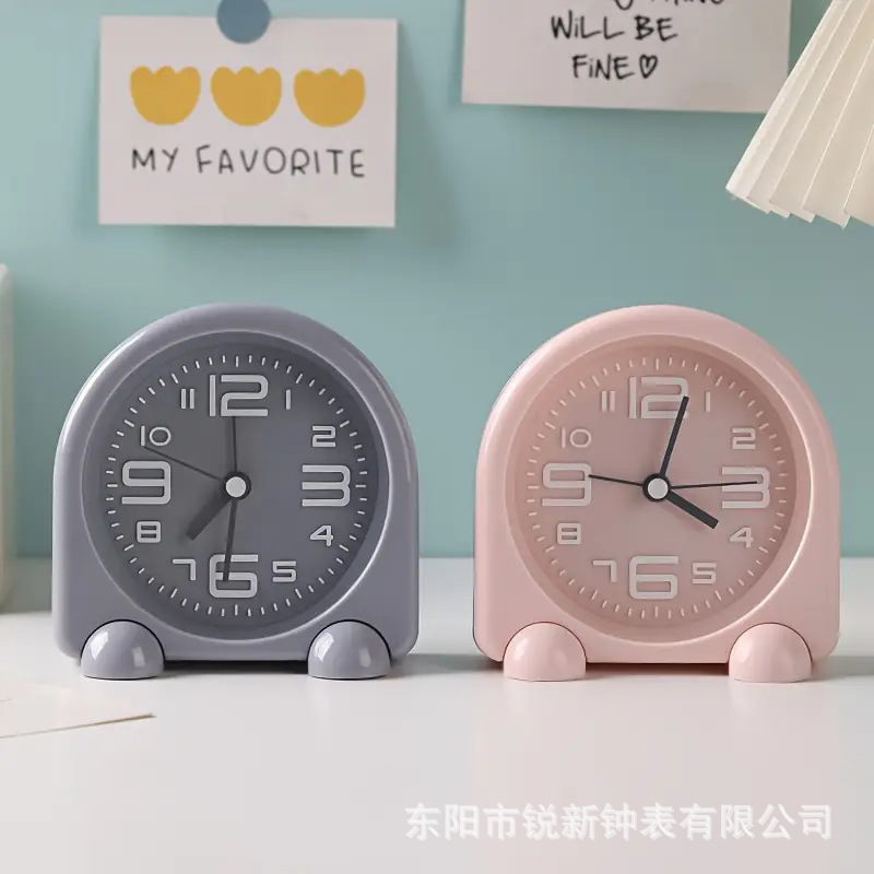 Fabricantes al por mayor nuevo reloj despertador silencioso de dibujos animados de metal gran número protección del medio ambiente lindo escritorio de dormitorio de estudiantes para niños