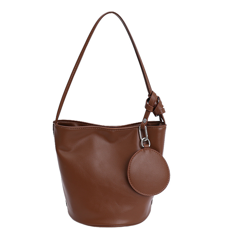 2025 nuevo bolso de mujer simple bolso de axila casual bolso de cubo de gran capacidad para mujer bolso de hombro de alta gama de moda