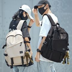 クロスボーダーのカバンの男性中学生の新型高校の大学生の女性の潮のブランドのカップルのリュックサックの大容量のコンピュータのリュックサック