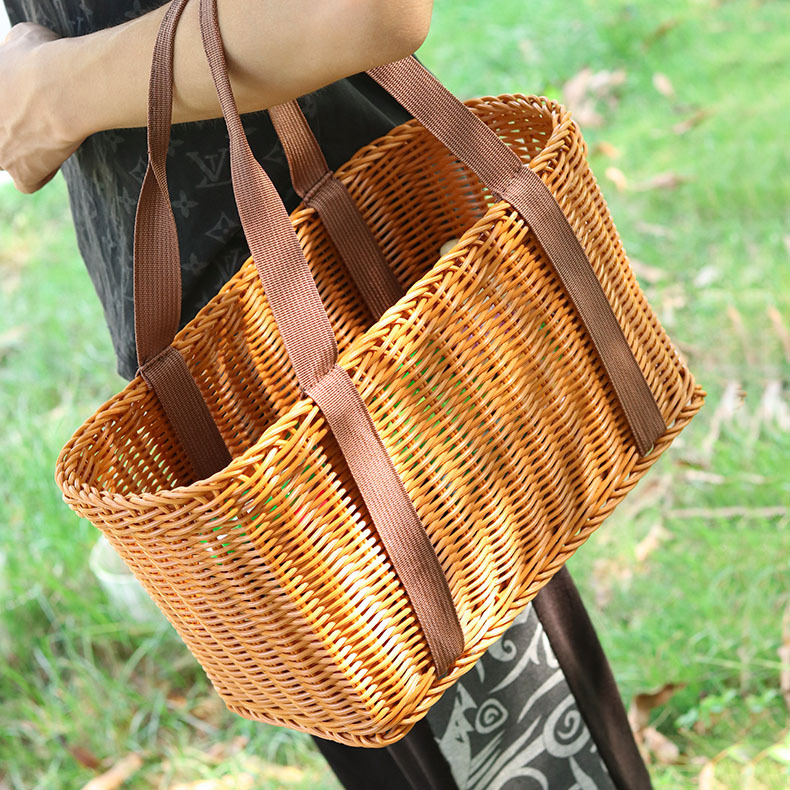 Imagen artesanía nuevo estilo pastoral tejido a mano respetuoso con el medio ambiente durable compras en casa cesta portátil cesta de almacenamiento de ratán