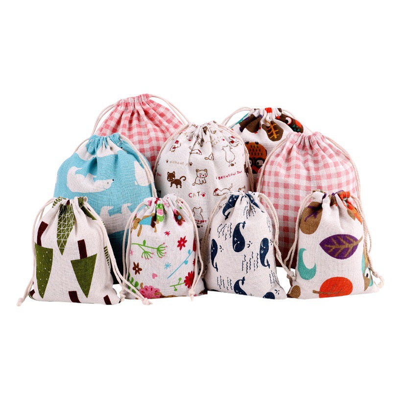 Fábrica en stock patrón creativo impreso algodón de mano cordón bolsa cordón regalo impresión cordón bolsa de almacenamiento al por mayor
