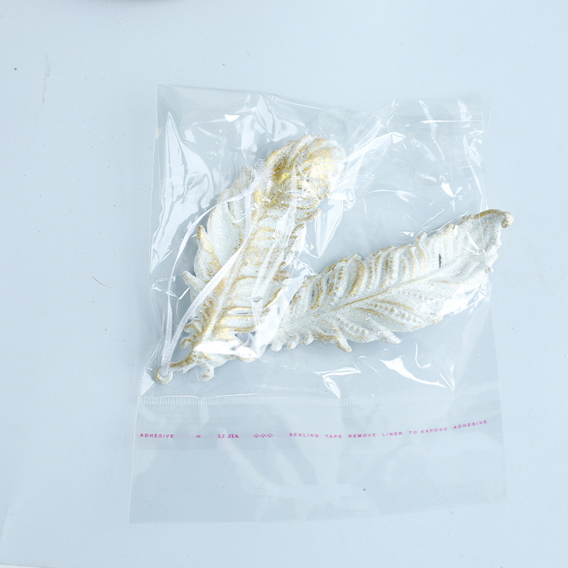 Fábrica de decoraciones de Navidad de oro platino campana de plástico amor hecho a mano árbol de Navidad decoración colgante en stock