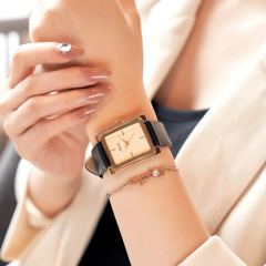 MISHALI, a minimalist and elegant small square watch with black and gold strap, quartz movement, in the same style as Chen Duling on Instagram.
