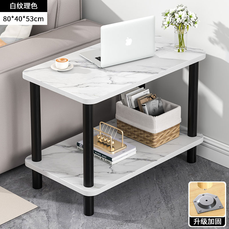 小さいテーブルのソファーの辺のいくつかのお茶のいくつかの家庭は移動することができます。|undefined
