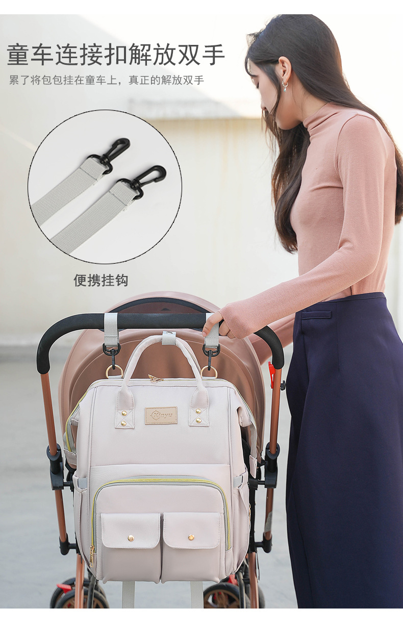 The 2025 new product is a high-end outdoor milk storage, heat preservation, large-capacity baby bag, multi-functional storage, and cross-border mommy bag undefined