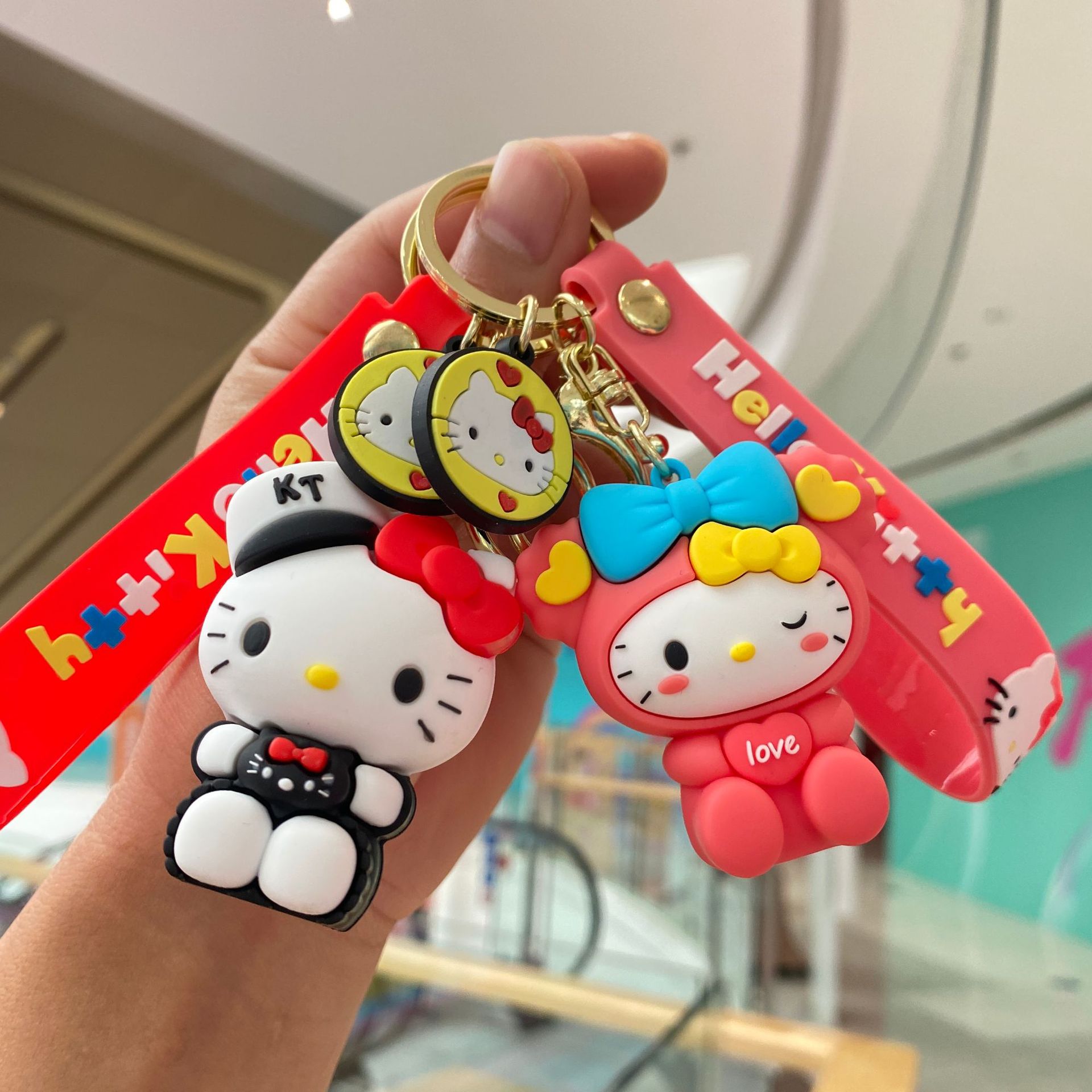 Arco KT gato llavero lindo muñeca de dibujos animados estudiante mochila colgante coche pequeño regalo al por mayor