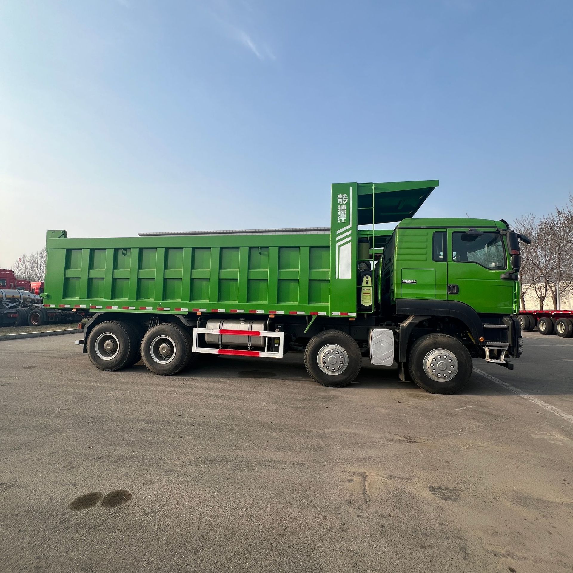 Exported to China: Sinotruk Sitrak Front-Four-Wheel-Drive Rear-Eight-Wheel Dump Truck, Specialized for Transporting Gravel and Soil