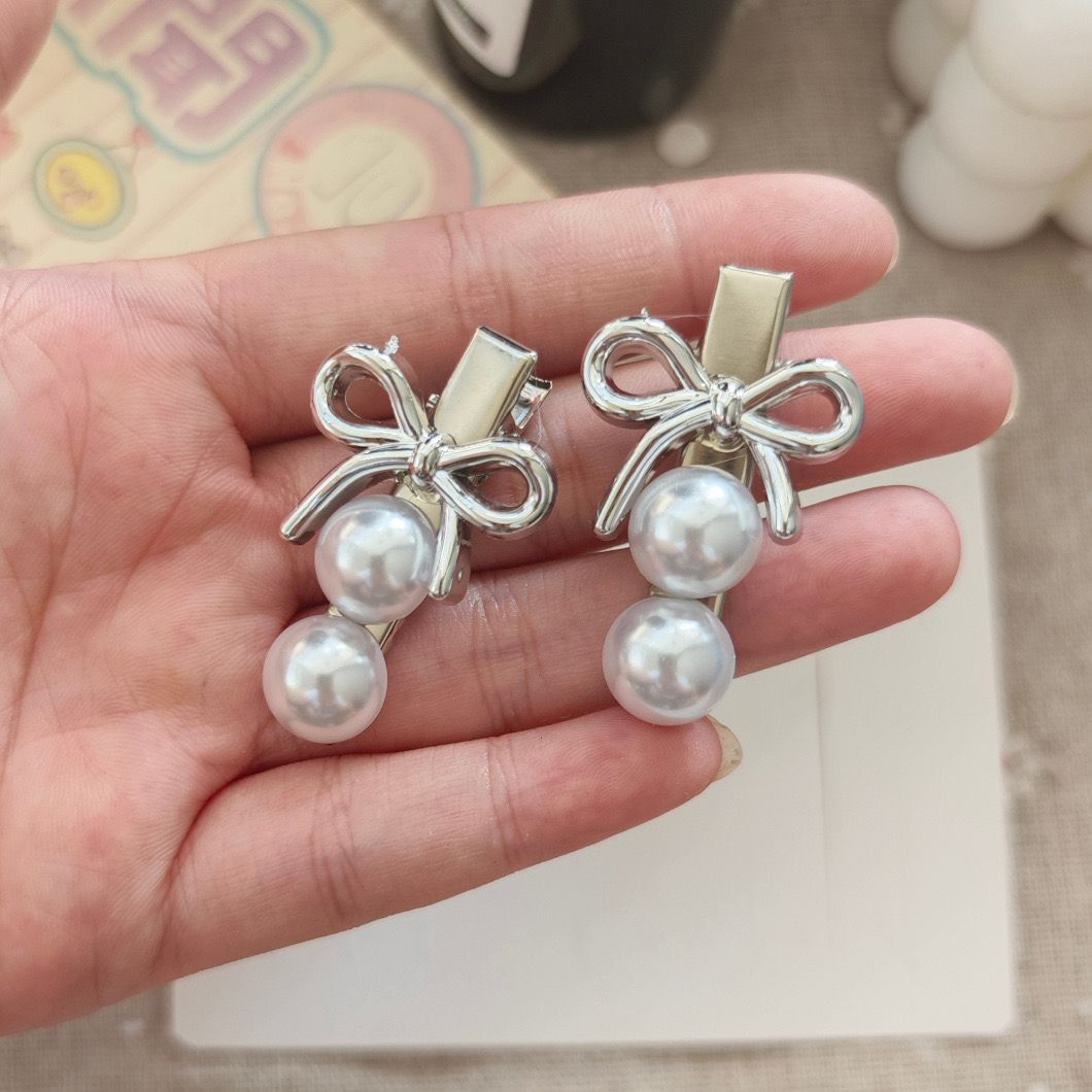 Elegant hårklämma med rosett och pärlor för tjejer_voghion.com