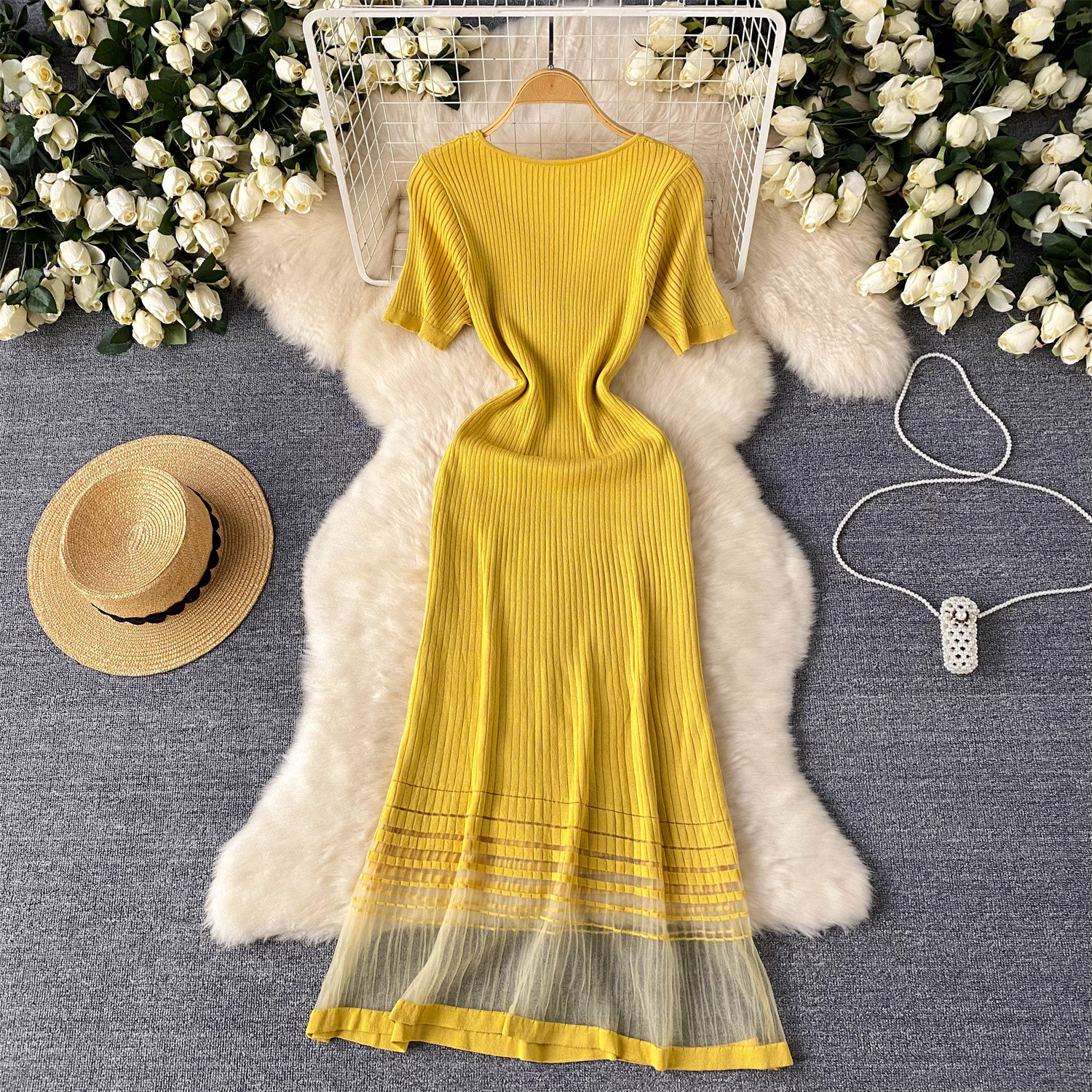 Robe tricotée haut de gamme de luxe légère de style de vêtements pour femmes pour femmes en été conception d'épissure de maille niche tempérament de célébrité robe longue_voghion.com