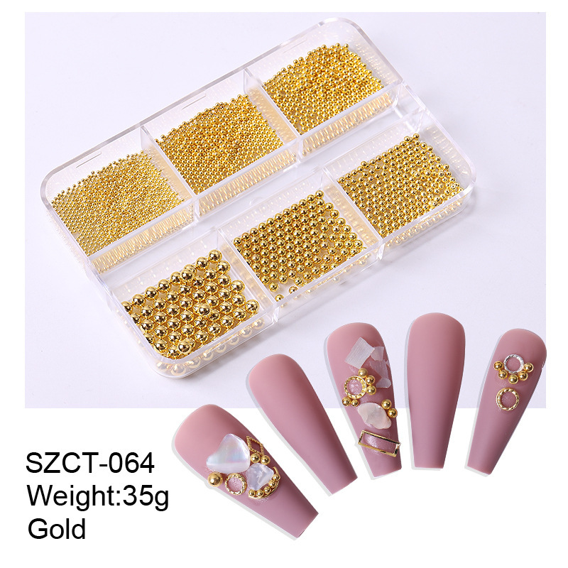 Accesorios de uñas transfronterizos al por mayor 6-grid nail aleación de acero cuentas oro plata tamaño mezclado decoraciones de uñas al por mayor