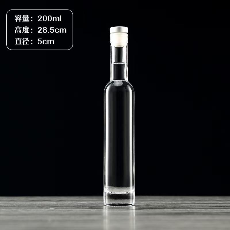 Botella de vidrio de vodka de alta calidad botella de vino de fruta cristal transparente de arena blanca dividida botella vacía con película de retracción térmica en stock