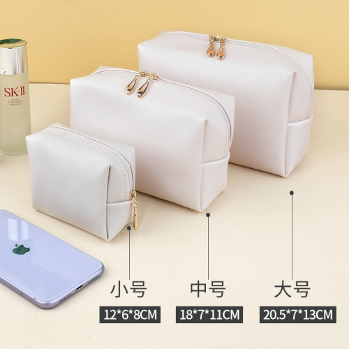 Foreign trade PU small hand-held cosmetic bag portable women's travel toiletry bag cosmetics storage bag wholesale