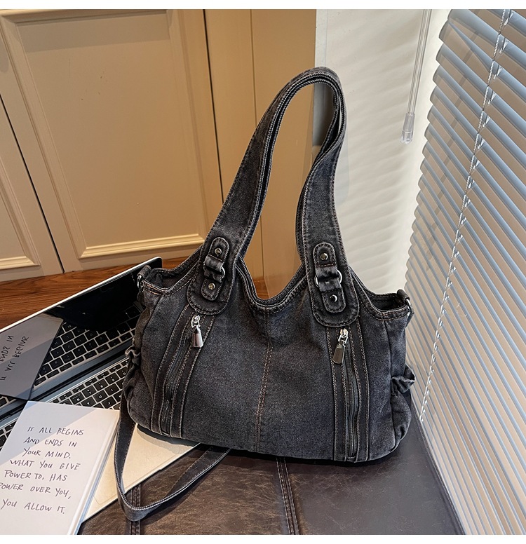 Bolsas de tendencia transfronteriza de gran capacidad para mujeres 2026 primavera nuevo retro jeans mochila de viaje simple tote