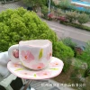 Розовые цветы — чашка и блюдце