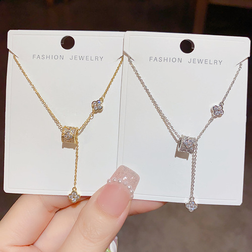 Light luxury niche design, high-end, small waist, four-leaf flower necklace, tassel, sweet temperament, fashionable and versatile clavicle chain