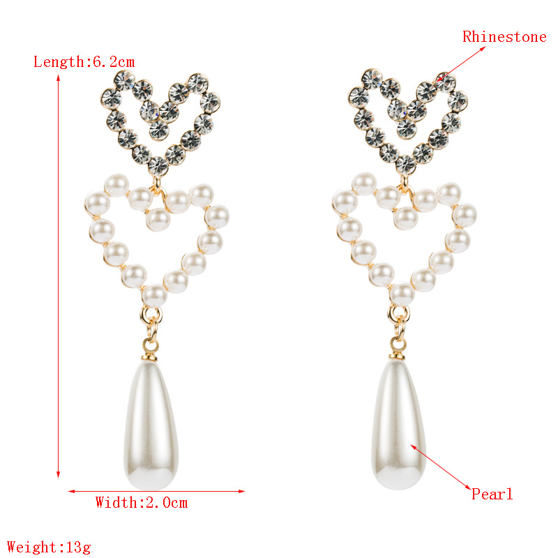 Boucles D&#39;oreilles En Forme De Coeur Avec Perles Et Diamants display picture 1