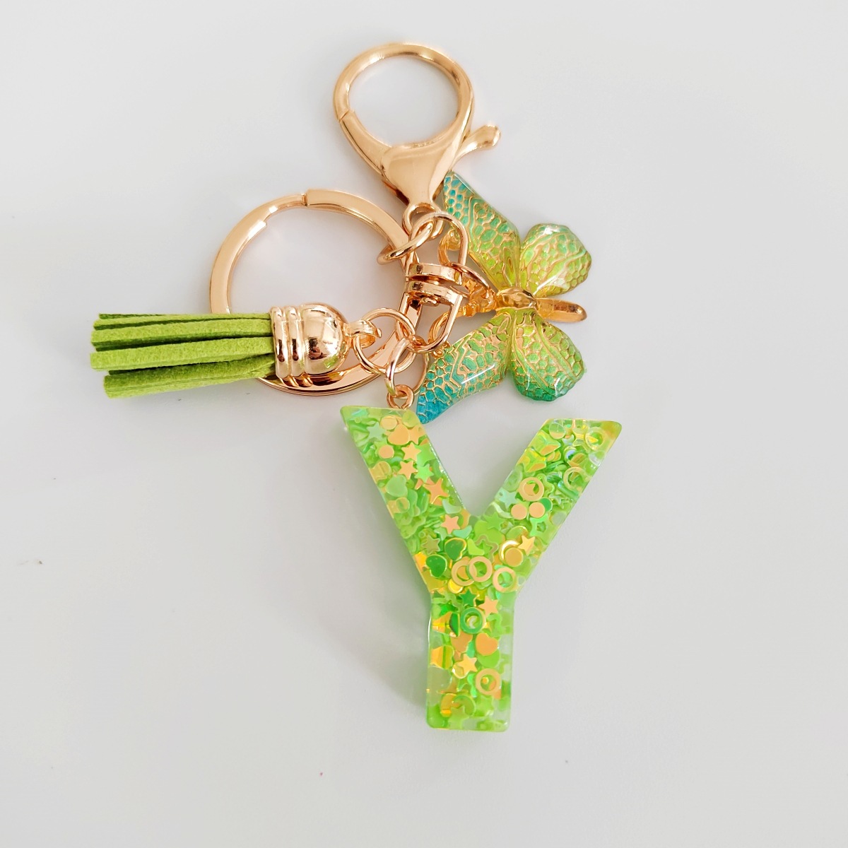 26 letras inglesas llavero colgante estrella verde brillo gota resina colgante llavero de personalidad europea y americana