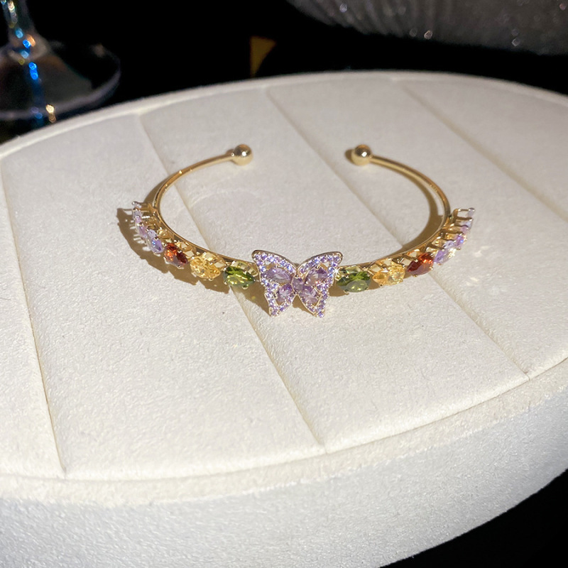 53 brazaletes - oro - color - morado