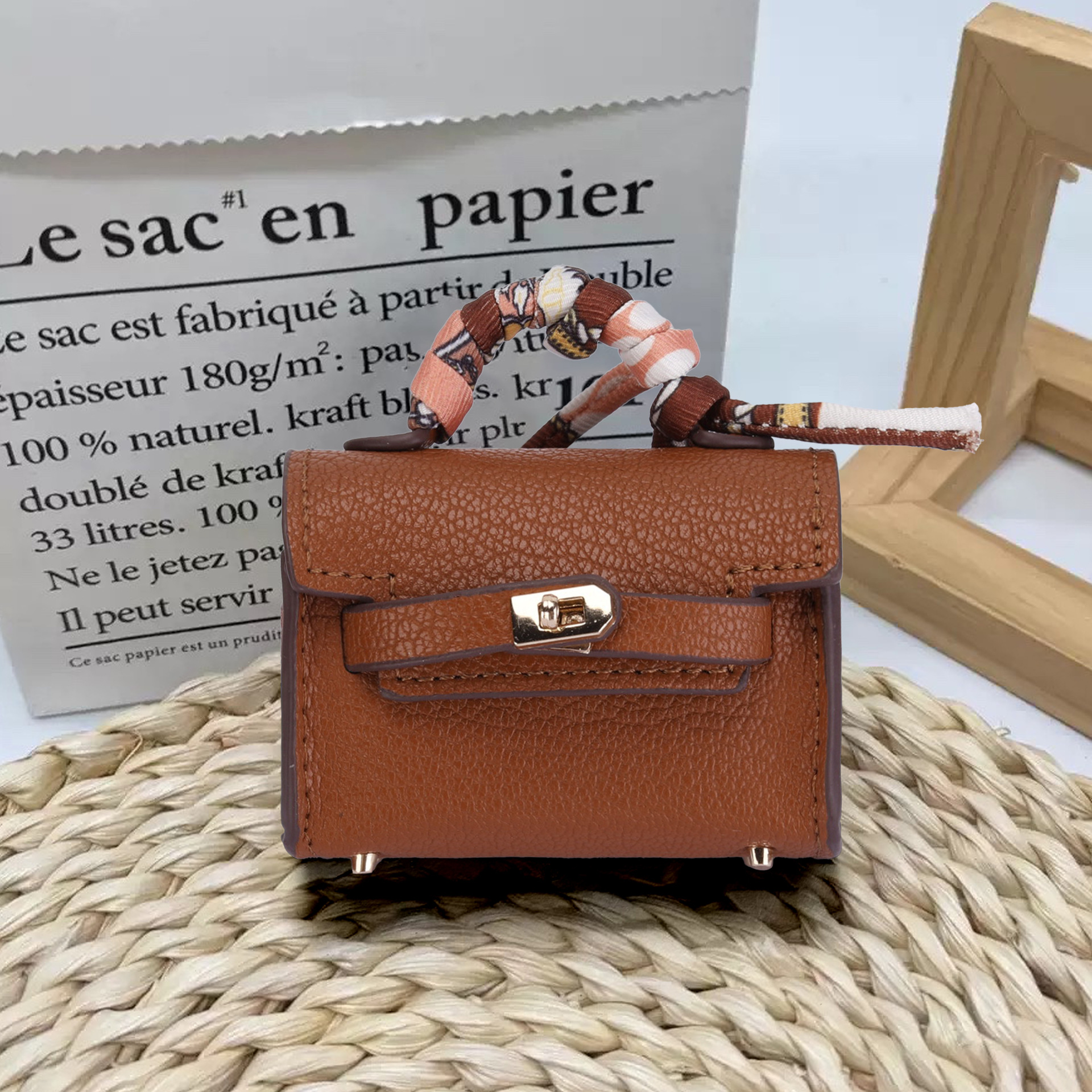 Mini bolso de cuero, bolso de colgante, colgante para Airpods, estuche de almacenamiento de auriculares, estuche de protección de auriculares, bolsa de almacenamiento