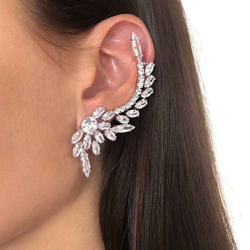 Fashionable asymmetrical earrings drop-shaped with zircon