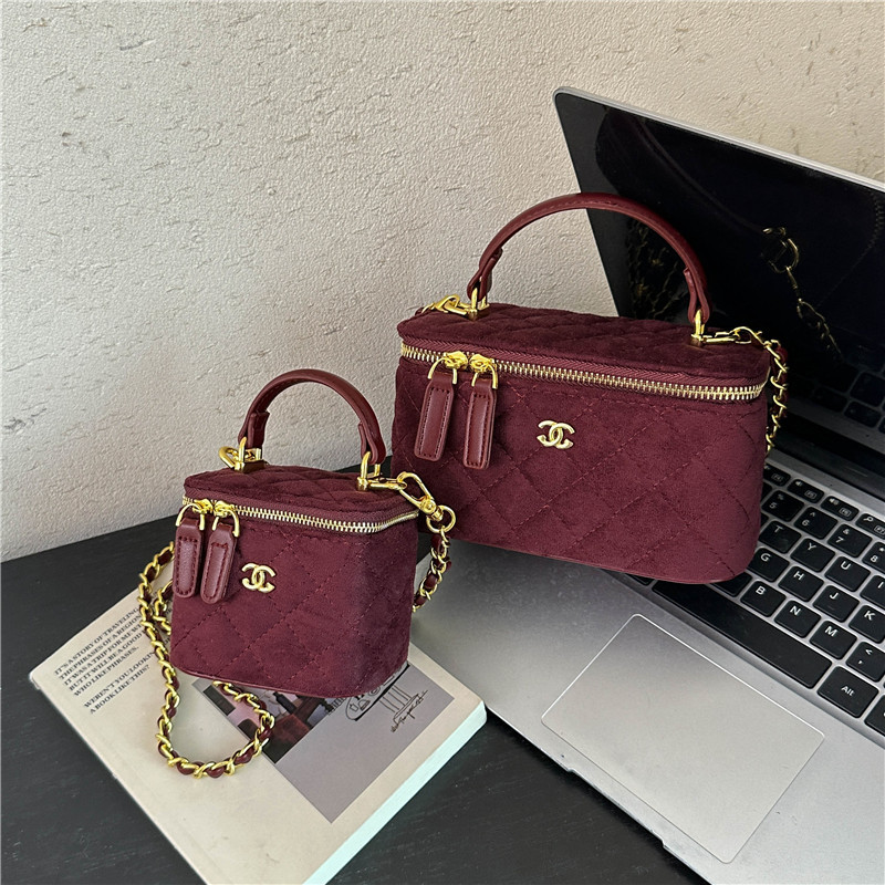 Trendy small Chanel-style women's handbag, featuring suede, diamond-patterned embroidery, a shoulder strap, a box-shaped design, and a chain strap for crossbody wear