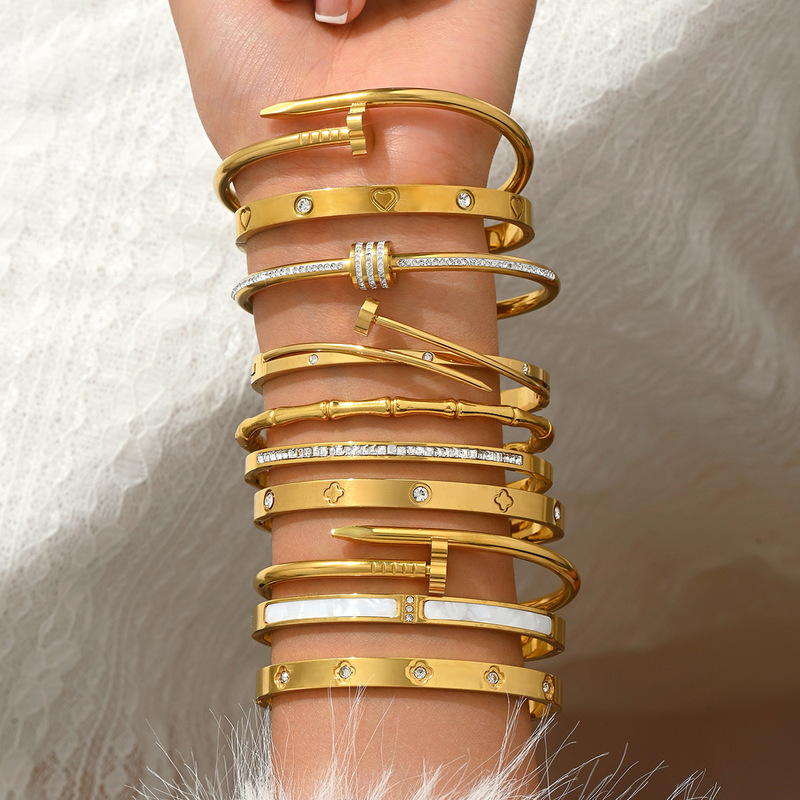 Cross-Border Stainless Steel Gold Bracelet Set with Diamond-Studded Nails, Small Waist-Shaped Four-Leaf Clover Bangles, and Diamond-Studded Bracelets Cross-Border Stainless Steel Gold Bracelet Set with Diamond-Studded Nails, Small Waist-Shaped Four-Leaf Clover Bangles, and Diamond-Studded Bracelets