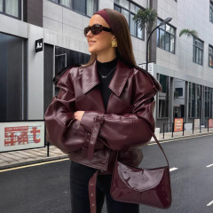 個性的な街頭のpu皮の襟の機関車のジャケットの女性の2025年の春の新型の復古風は袖口のコートを調節することができます。