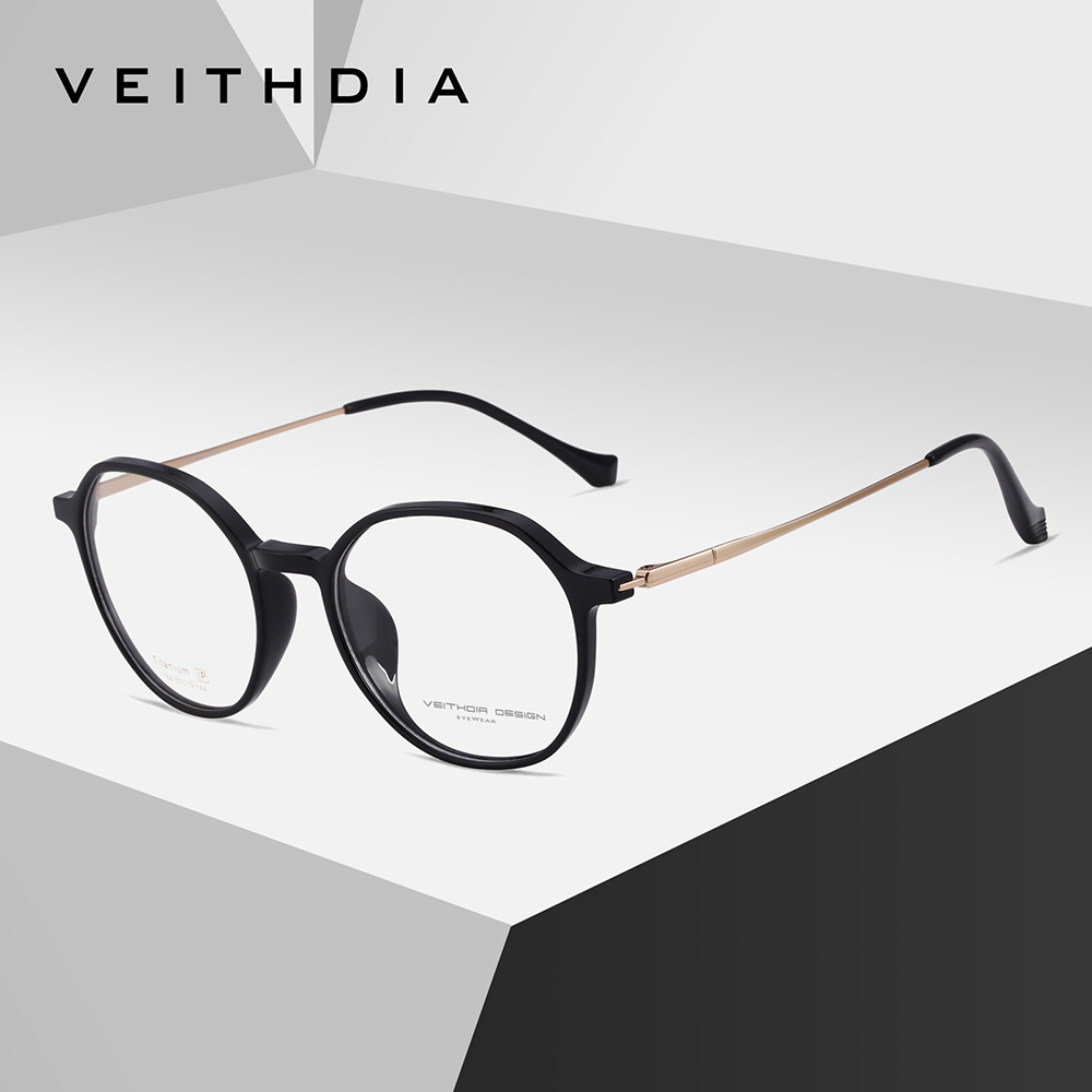 Pie de titanio puro marco de espejo de miopía óptica retro marco de ojo para hombres y mujeres puede estar equipado con grado spot al por mayor 7168